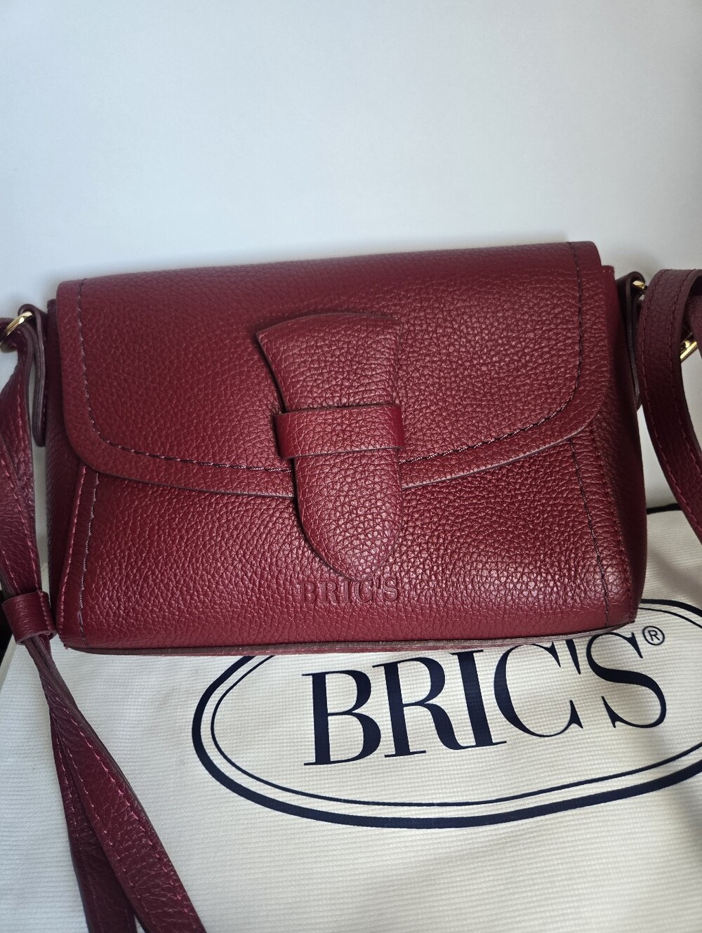 Bric's Burgundy Pebbled Leather Crossbody Bag